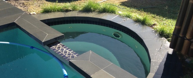 pool coping spa slate curve swim landscaping