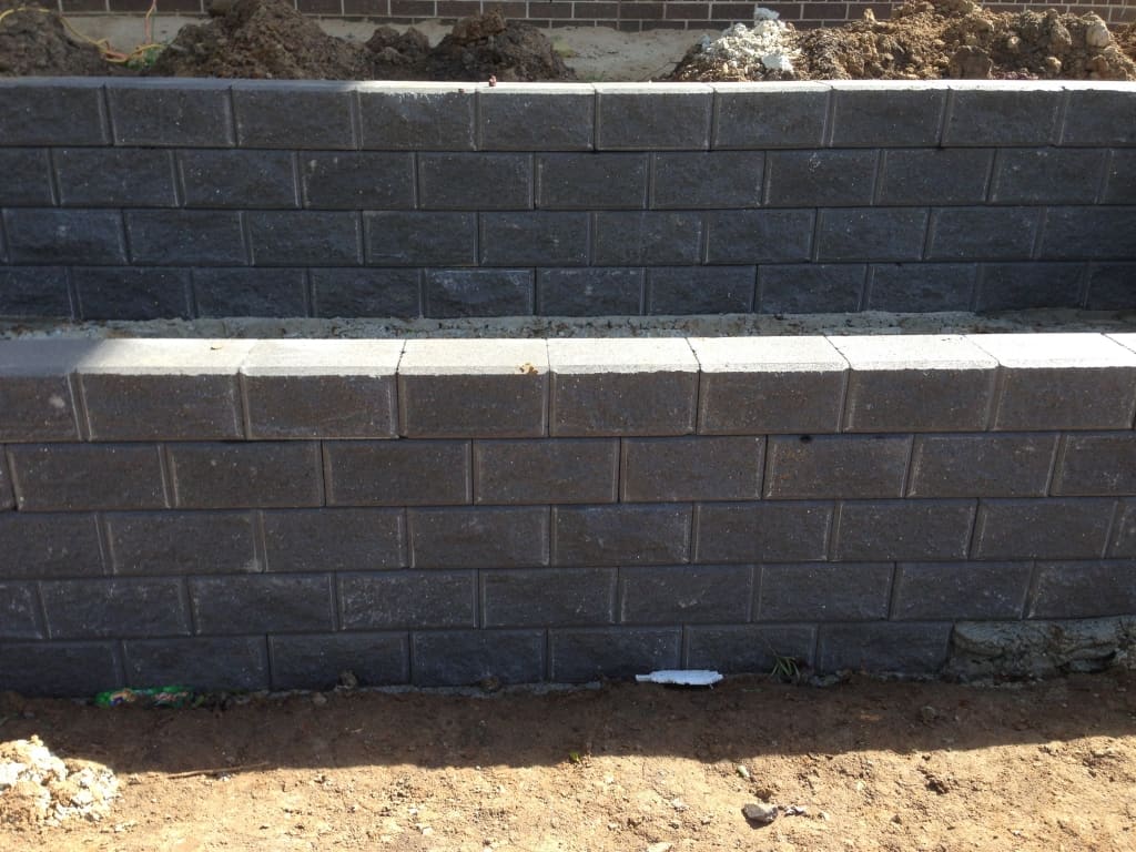 brick wall grey landscaping retaining